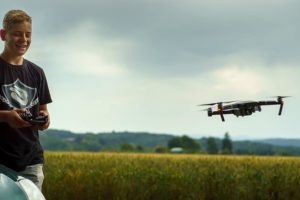 student with drone